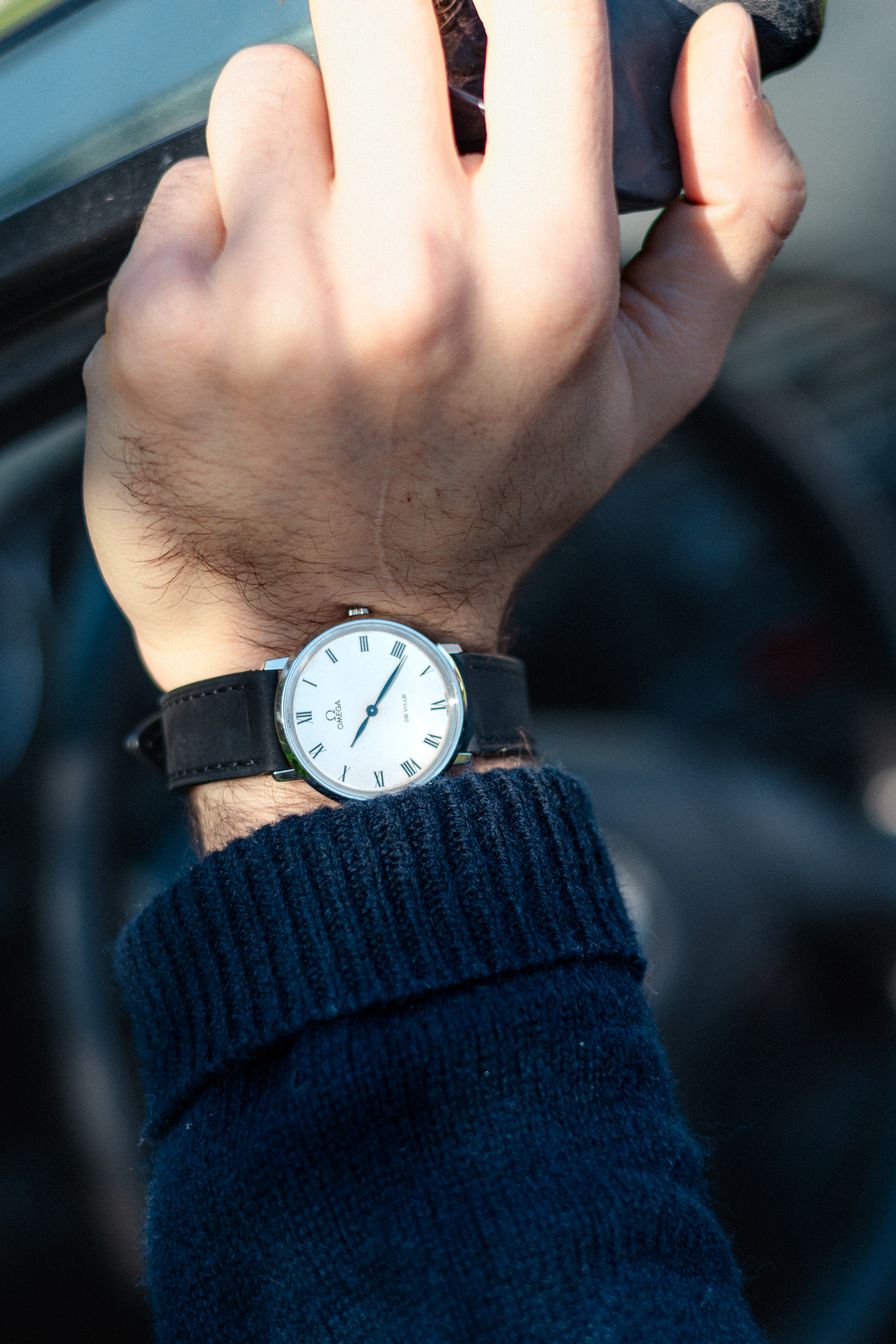 Montre Omega au poignet